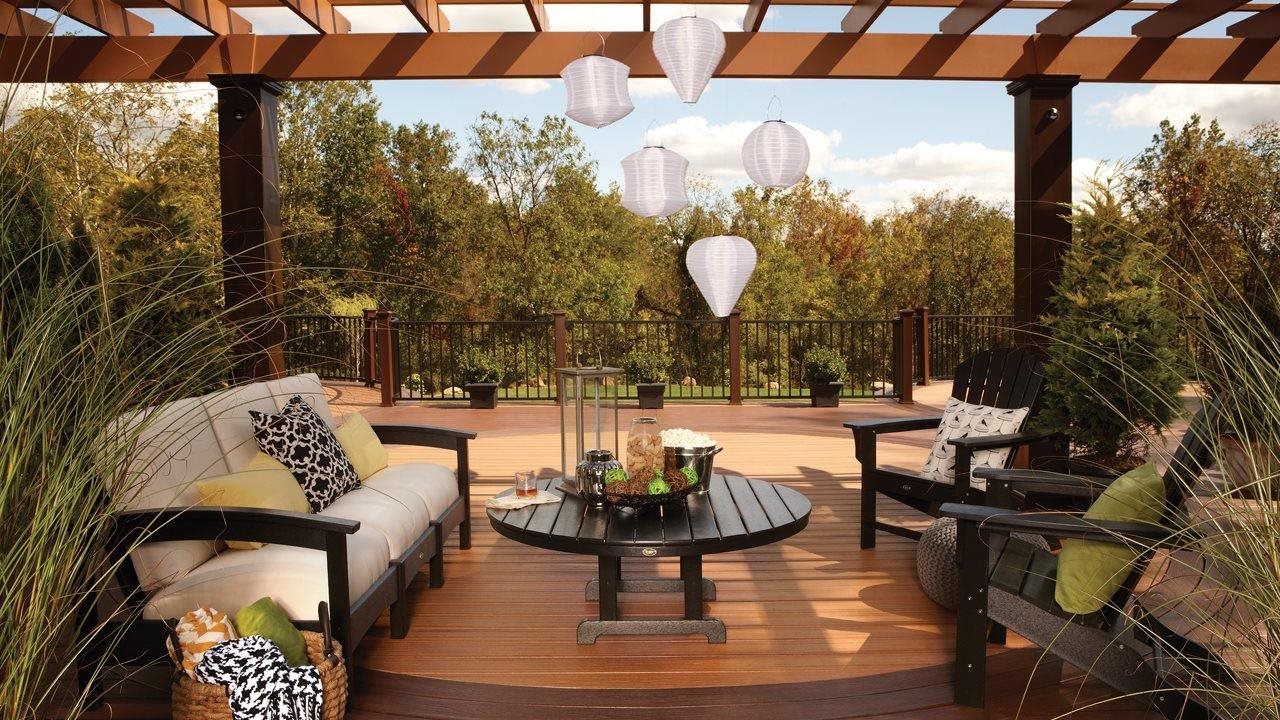 open outdoor living area on deck with pergala